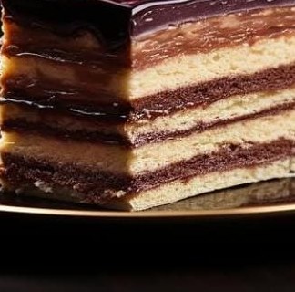Slice of layered opera pastry with ganache