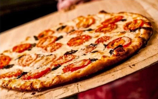 Wood-fired pizza fresh from the oven